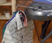Practical system to hook the coat hangers while ironing